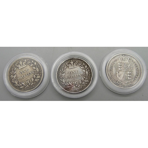 921 - Three Victorian shillings, two bun heads, 1866 and 1855, and one veiled head, 1887