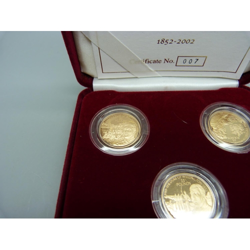 931 - A Royal Mint 2002 coin set, Channel Islands three gold proof coin set, 150th Anniversary of The Duke... 