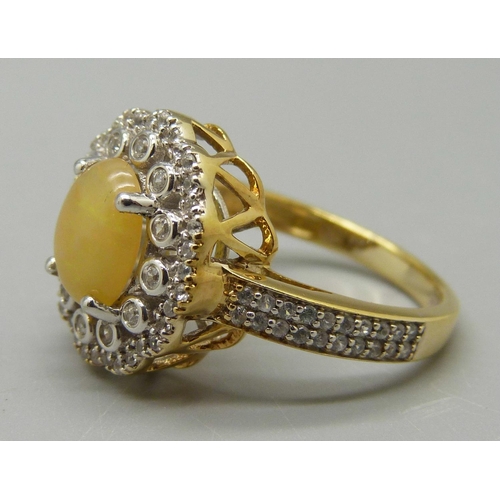 992 - A silver gilt, Ethiopian opal and white zircon cluster ring, P