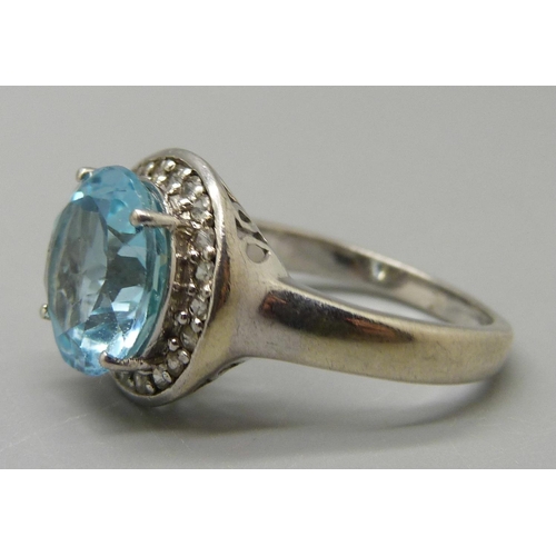 997 - A silver and topaz ring, R