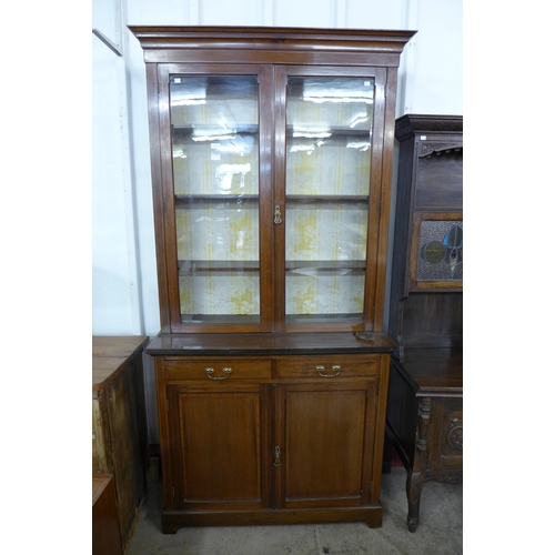 122 - An Edward VII inlaid mahogany bookcase