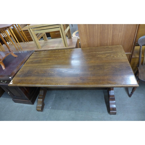 129 - An oak refectory table