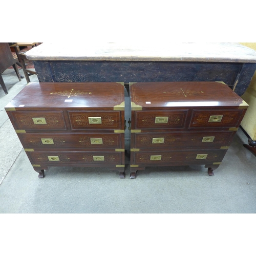 140 - A pair of small eastern hardwood and brass inlaid campaign style chests of drawers