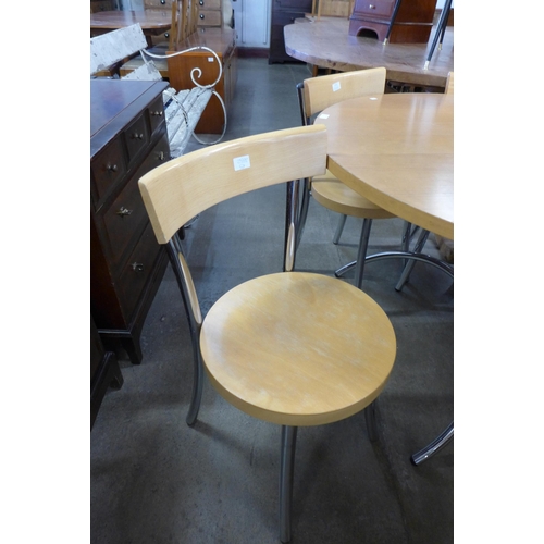 170 - A circular chrome and beech kitchen table and four chairs