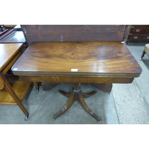 176 - A Bevan funnell mahogany fold over games table