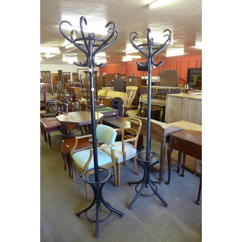 187 - A pair of ebonised bentwood coatstands