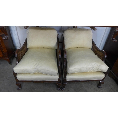 204 - A mahogany and bergere three piece suite