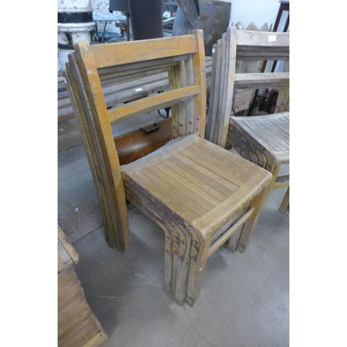 213 - Eight vintage wooden stacking chairs