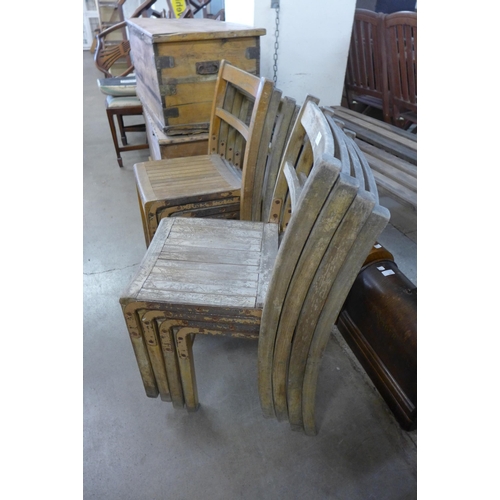 213 - Eight vintage wooden stacking chairs