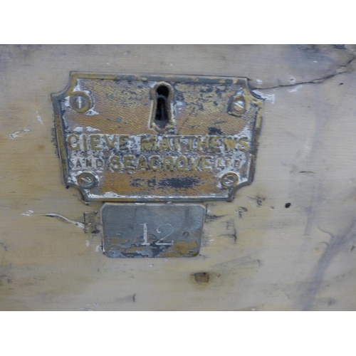 216 - A metal bound ship's chest with Gieve Matthews and Seagrove Ltd. plaque