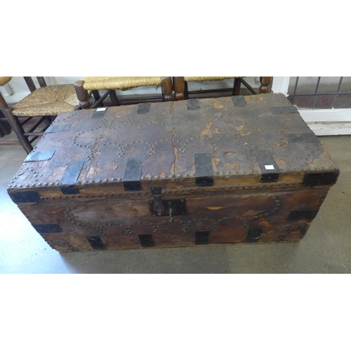 222 - A 19th Century leather and iron bound steamer trunk