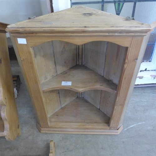 224 - Two pine plate racks and a small hanging corner cupboard