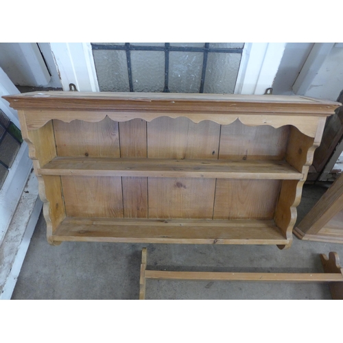 224 - Two pine plate racks and a small hanging corner cupboard