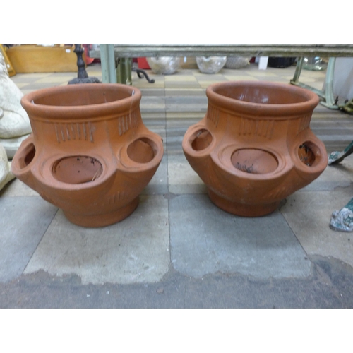 262 - A pair of terracotta strawberry pots