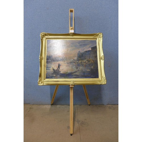 290 - A Venetian landscape, oil on board, indistinctly signed, framed with easel