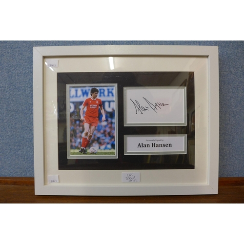 300a - A signed and framed photograph of Alan Hansen