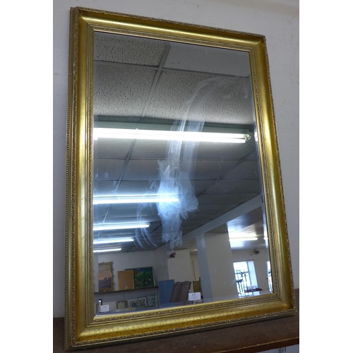 329 - A gilt framed mirror