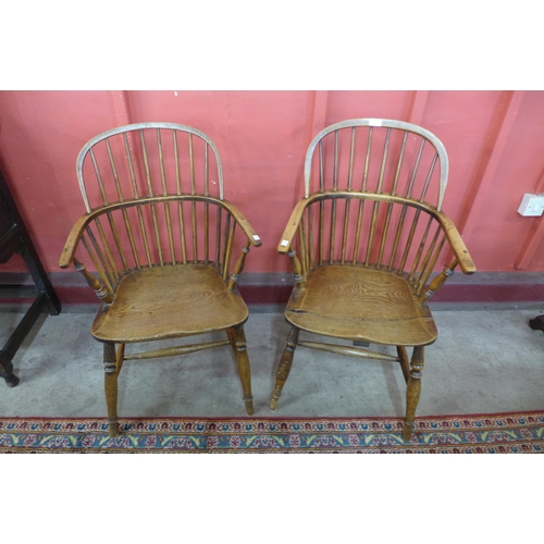 82 - A pair of Victorian elm Windsor armchairs