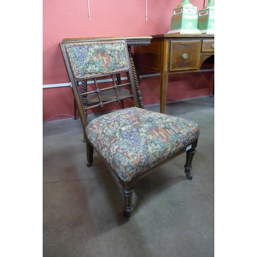 95 - An Arts and Crafts mahogany fire side chair