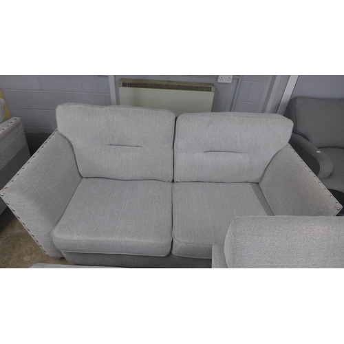 1486 - A Coco grey and silver fleck pair of three seater sofas, chair and footstool (handling marks)