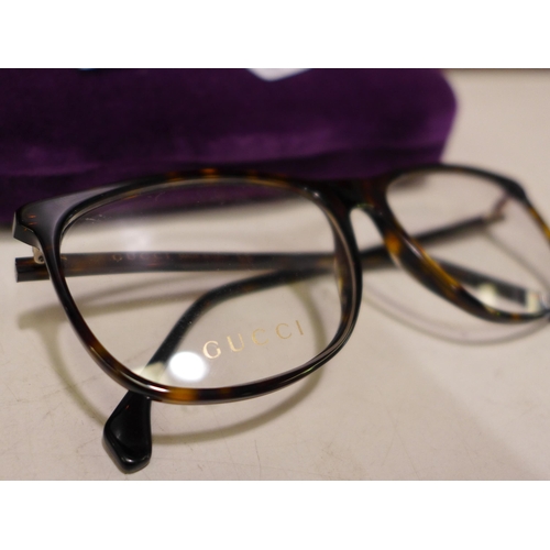 3125 - Gucci Tortoiseshell Plastic Glasses (GG0554O), original RRP £179.77 + VAT, (258-261)   * This lot is... 