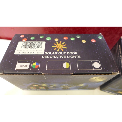 3170 - Two multi-coloured garden solar light sets with remotes