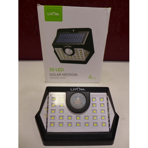 3201 - Four Litom 30 LED solar motion sensor lights