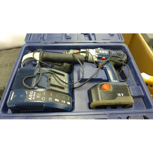 2106 - AEG 18V hammer drill with charger, in case