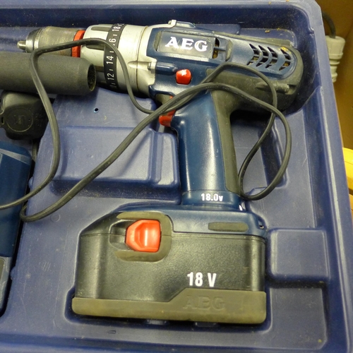 2106 - AEG 18V hammer drill with charger, in case