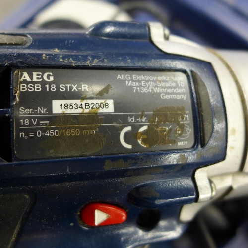 2106 - AEG 18V hammer drill with charger, in case