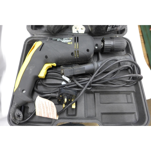 2109 - Four assorted power tools:- 3 drills and Ryobi jigsaw