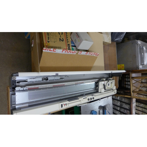 2257 - An Empisal knitmaster 700 knitting machine, a Knitmaster LC-2 transfer lace carriage, fits 600K/380K... 