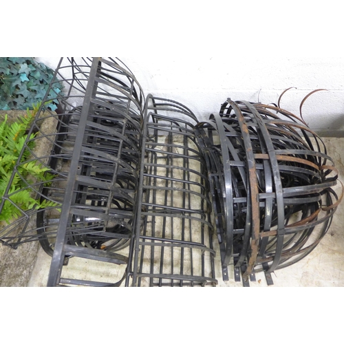 2328 - Approx 9 metal trough style planters and nine basket planters