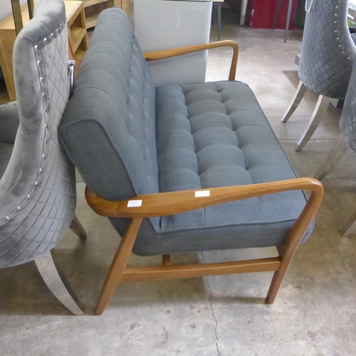 1353 - A grey upholstered two seater sofa - split frame, both sides * this lot is subject to VAT