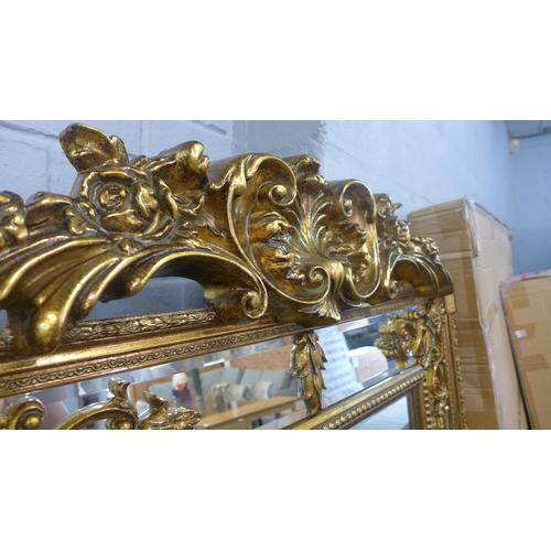 1416 - A large gilt French style mirror with crest, H 183cms (M32189)   #