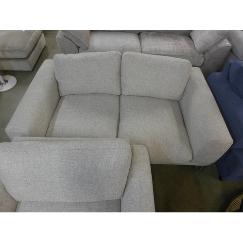 1439 - A champagne textured weave oversized armchair and two seater sofa, both on chrome legs