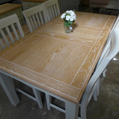 1443 - A washed oak and stone dining table and six chairs