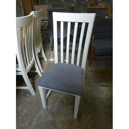 1443 - A washed oak and stone dining table and six chairs