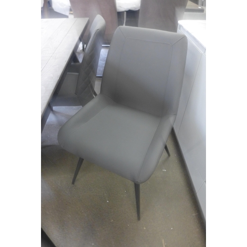 1479 - A grey timber and steel dining table and four chairs - scuffed chairs