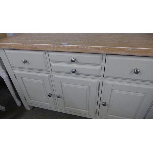 1485 - A Three door three drawer sideboard