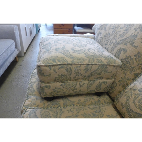 1672 - A magnolia and teal floral upholstered two and three seater sofas