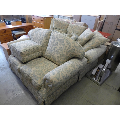 1672 - A magnolia and teal floral upholstered two and three seater sofas