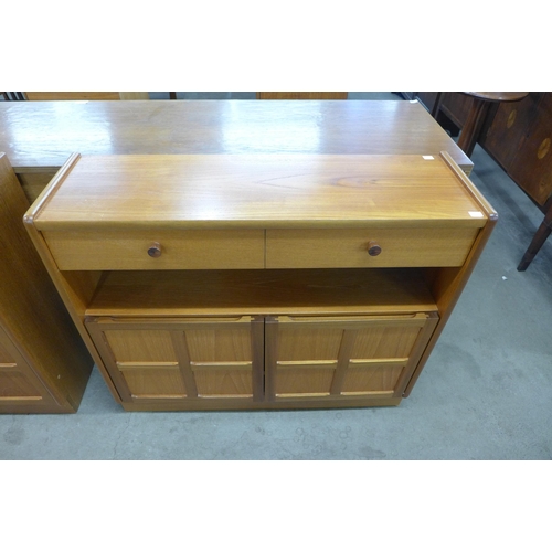 28 - A pair of Nathan Squares teak two door cupboards