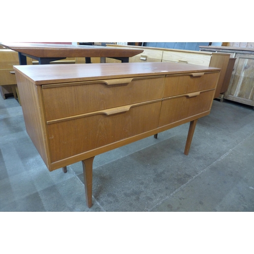 40 - A small teak sideboard