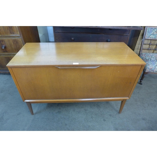 62 - A teak record cabinet