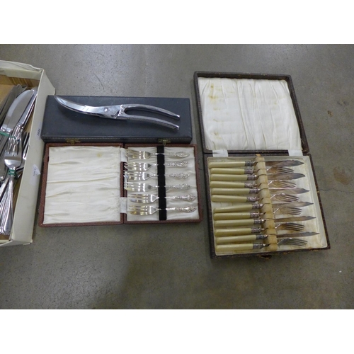 1031 - A collection of plated flatware, modern cutlery, two boxed sets, etc.