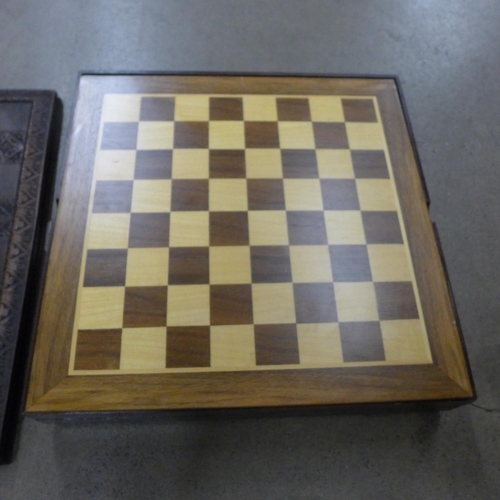 1043 - A collection of board games including chess sets, dominoes and playing cards