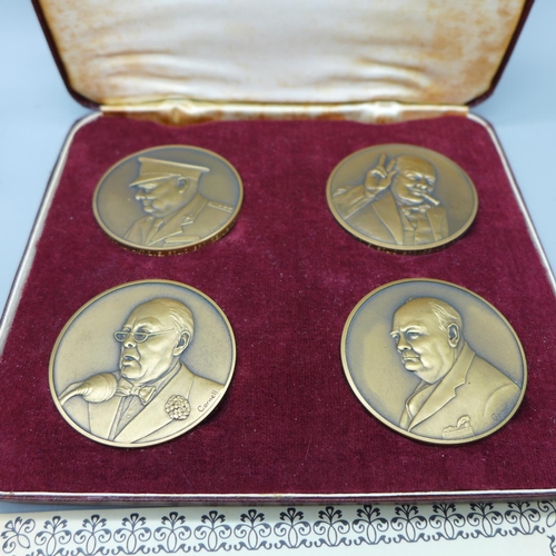 627 - Six commemorative medals; a set of four The Churchill Medals and a pair of 700th Anniversay of Caerp... 