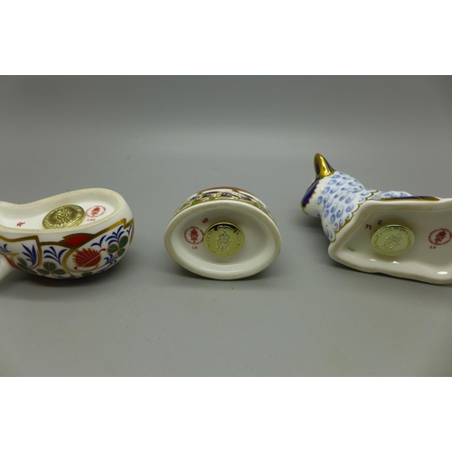 630 - A Royal Crown Derby Sleeping Pig paperweight, ladybird and lamb, all with gold stoppers