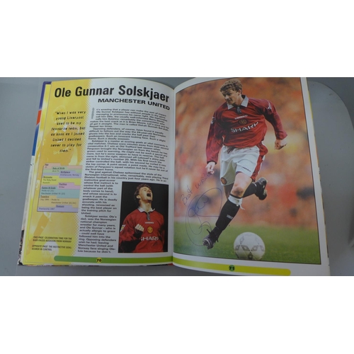 695 - Football; a copy of Superstars of the Premier League 1998-99 containing several signatures from form... 